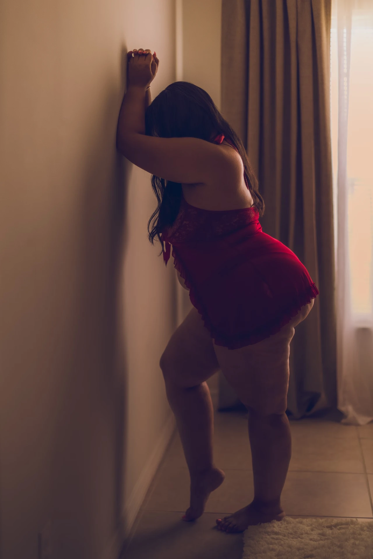 Reclaiming self worth after weight loss - shadow-play boudoir transformation in Titusville.